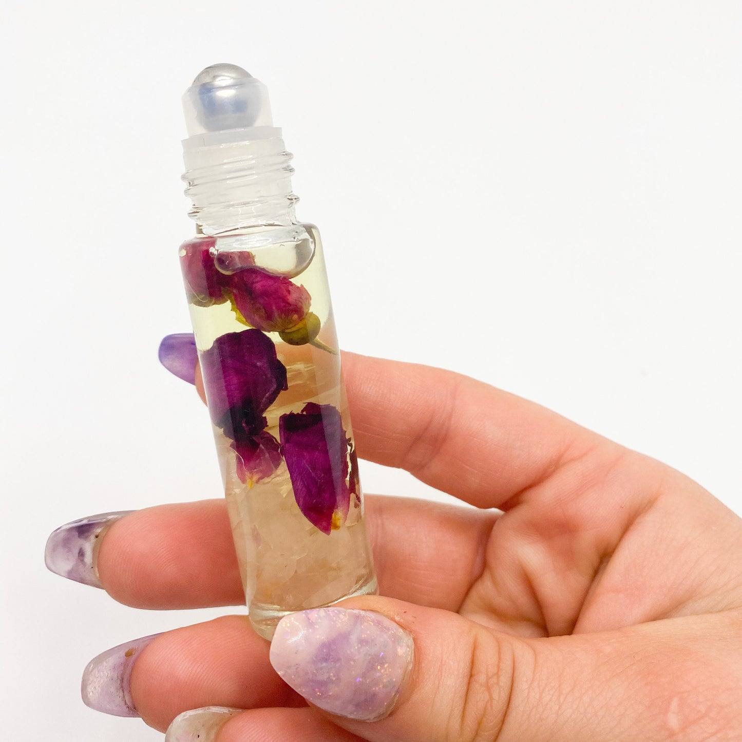 Crystal infused essential oil, roller bottle