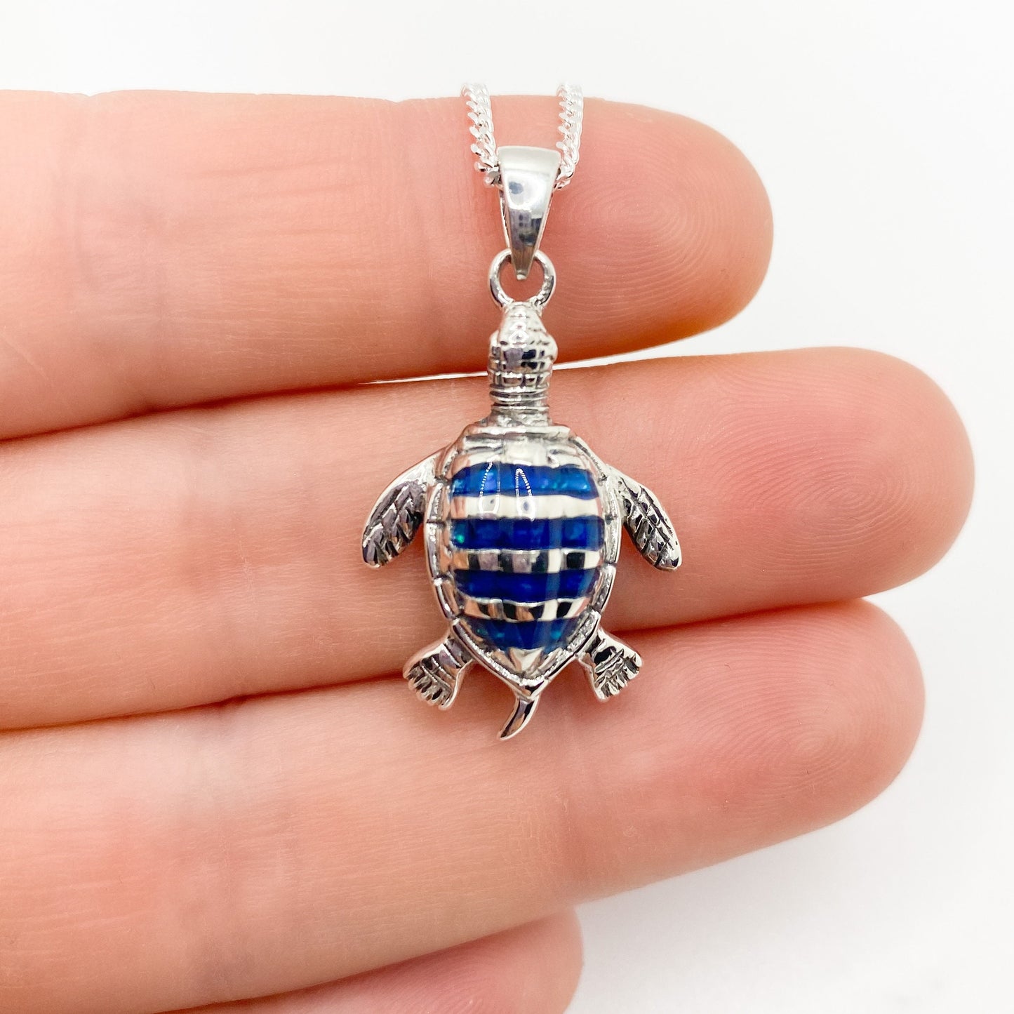 Paua shell turtle pendant